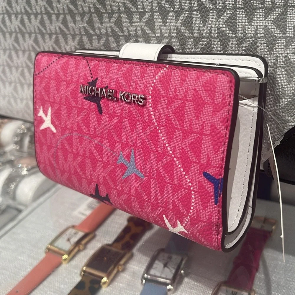 Michael Kors Jet Set Travel Md Printed Signature Logo Bi-Fold Wallet
Dragonfruit - Picture 2 of 16